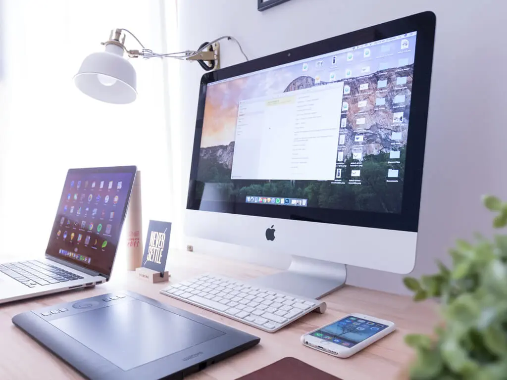 Desktop and Laptop on desk